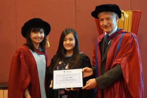 Su Lim Yang receiving her prize for the Best Overall Achiever from Professor Ian MacDonald and Dr Kang Nee Ting.