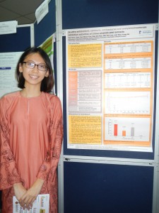 Liew Sok Sian presenting a poster detailing findings from her final year project.
