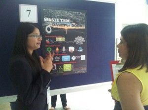 Suganti RAMARAD (left) from the Department of Chemical & Environmental Engineering, with her poster titled Waste Tyre: Dawn or Doom?