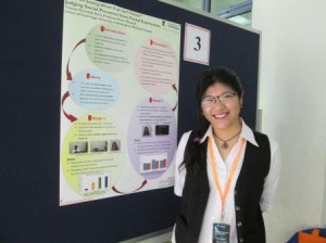 Yvonne Kah Hooi TEOH from the School of Psychology, with her poster titled "Are you seeing what is or isn't there?" - Judging Social Presence from Facial Expressions