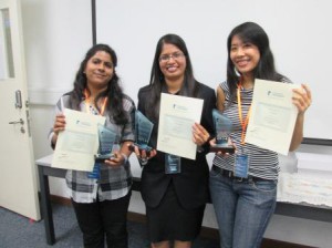 [From left] Renu - recipient of the Best Visual Flair Award, Suganti - recipient of the Judges' Choice Award, and Phui Cheng - recipient of the Best Press Release Award  