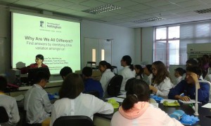 Dr Yuh Fen explaining the concept of genotyping to Kazakhstan students before the practical session.