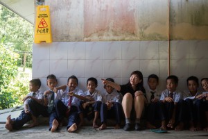 Dr Ting KN with the school children waiting for the next activity