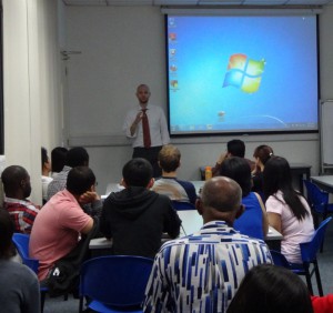 Dr Christopher Hill delivering briefing on Graduate School's support for DTP students